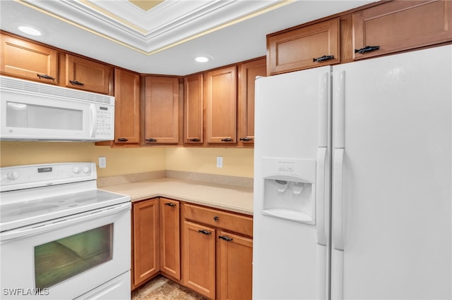 kitchen with white appliances and crown molding