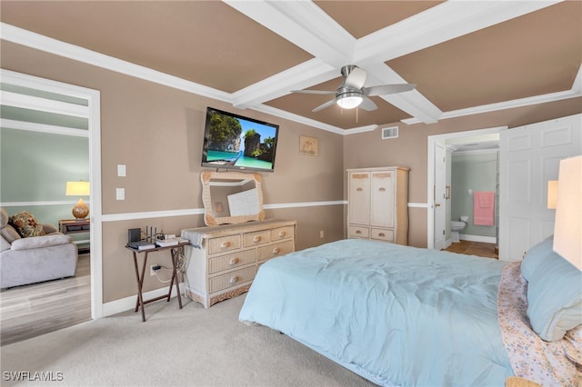 carpeted bedroom with coffered ceiling, ceiling fan, crown molding, beam ceiling, and connected bathroom