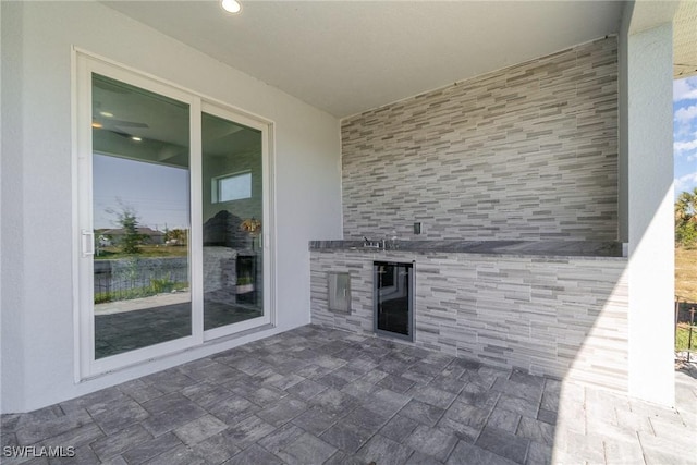 view of patio with an outdoor kitchen