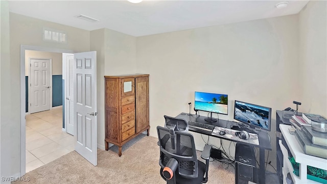 office area with light colored carpet