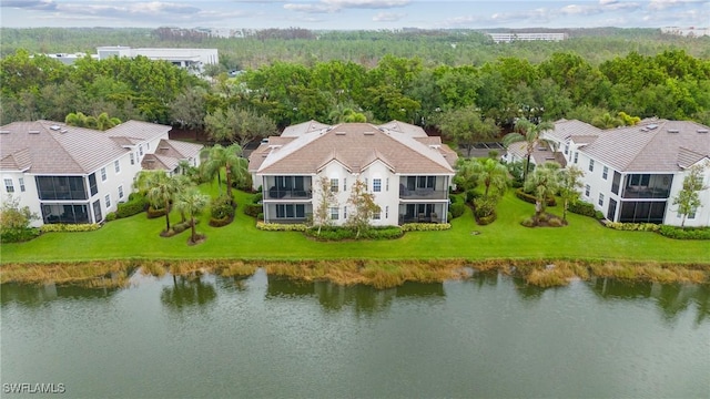 drone / aerial view with a water view