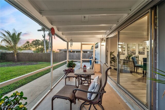 view of balcony at dusk