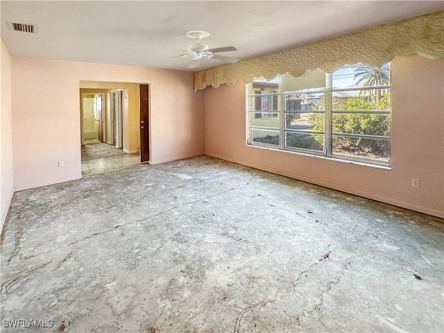 unfurnished room with ceiling fan