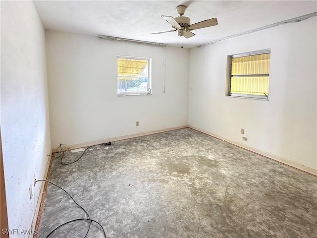 unfurnished room featuring ceiling fan