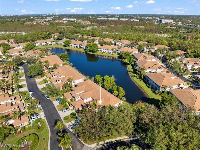 aerial view featuring a residential view and a water view