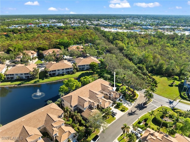 aerial view with a water view and a residential view