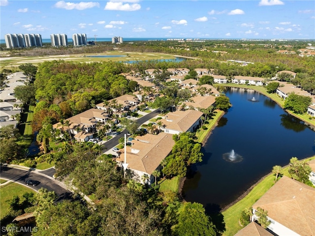 aerial view featuring a water view and a residential view