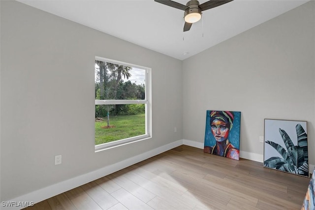 unfurnished office featuring ceiling fan and light hardwood / wood-style floors