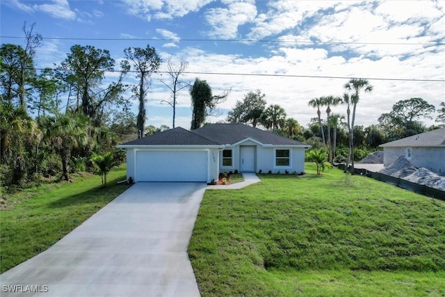 view of front of home with a garage and a front yard