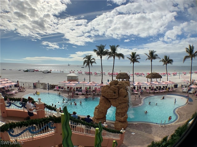 property view of water with a beach view