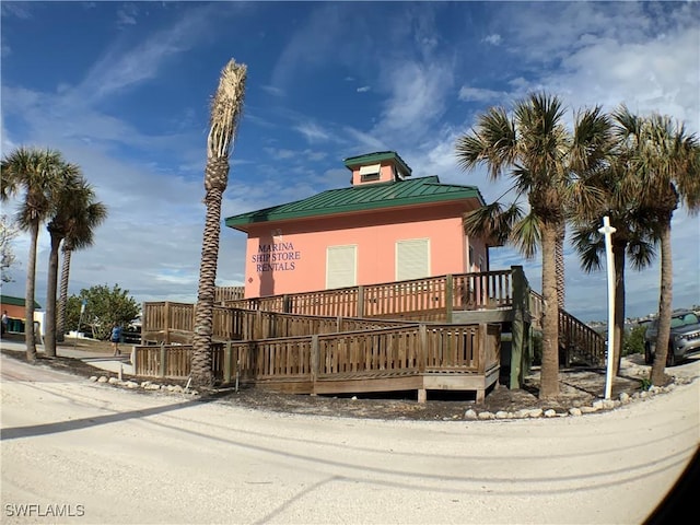 view of front of house featuring a deck