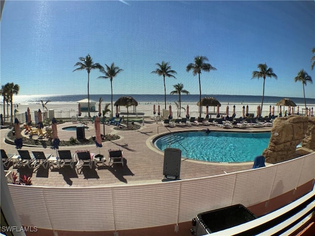 140 Estero Blvd Unit 2101, Fort Myers Beach, FL 33931 - community pool with a patio area and a water view
