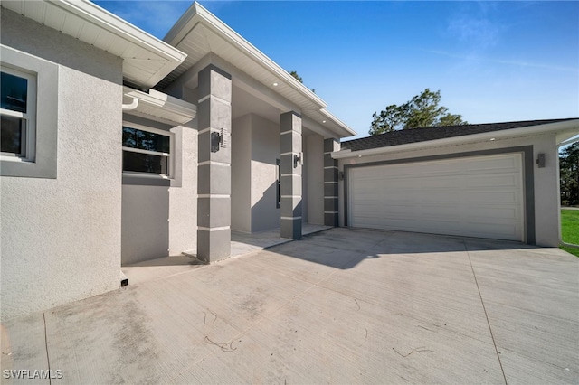 view of front of property with a garage