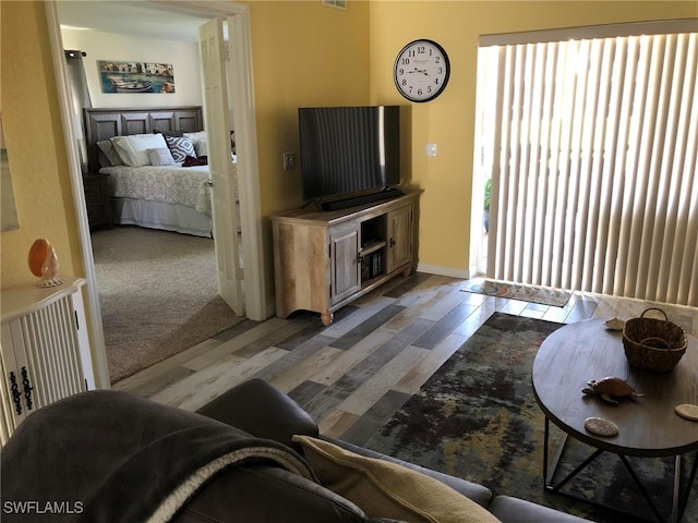 living room with light colored carpet