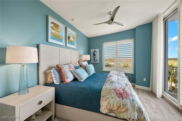 carpeted bedroom with access to outside and ceiling fan