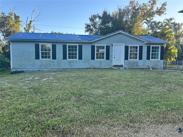 single story home with a front yard