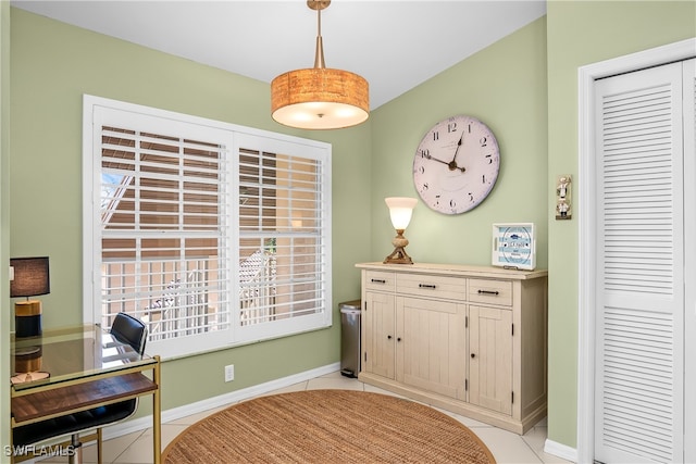 office space with light tile patterned floors