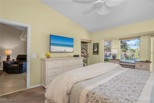 bedroom featuring light carpet, ceiling fan, and lofted ceiling