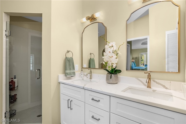 bathroom with vanity and an enclosed shower