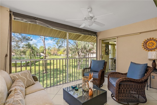 sunroom / solarium with ceiling fan