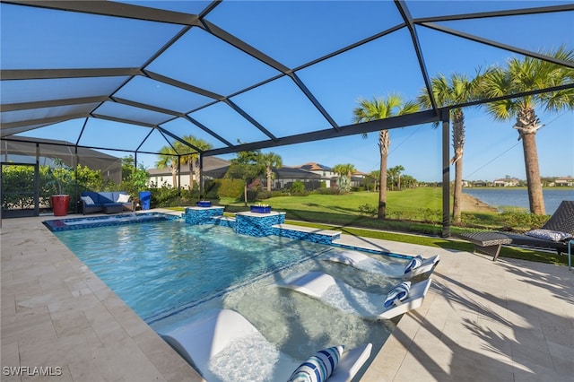 view of pool with a lanai, a jacuzzi, pool water feature, a patio area, and a water view