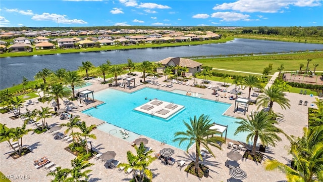 view of pool featuring a water view