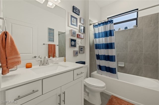 full bathroom featuring toilet, vanity, and shower / tub combo with curtain