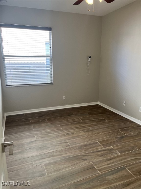 spare room with ceiling fan