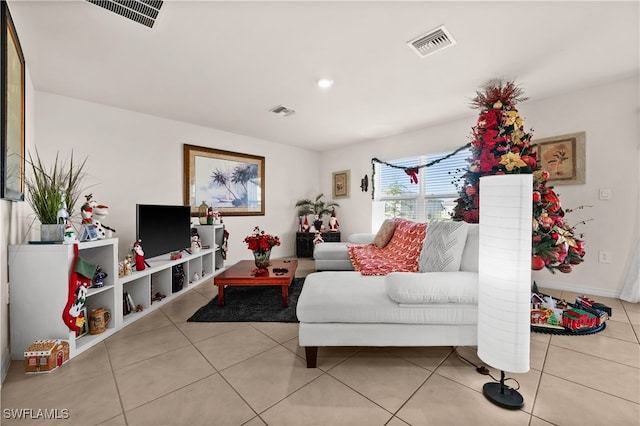 living room with light tile patterned floors