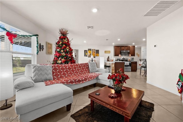 7024 Waldo Cir, Labelle, FL 33935 - living area with light tile patterned floors and recessed lighting
