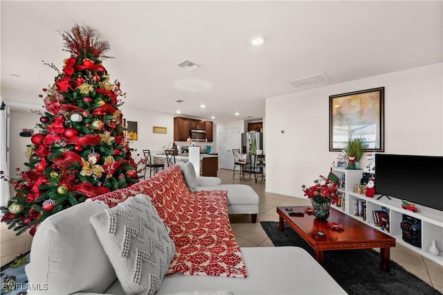 7024 Waldo Cir, Labelle, FL 33935 - living area featuring light tile patterned flooring and recessed lighting