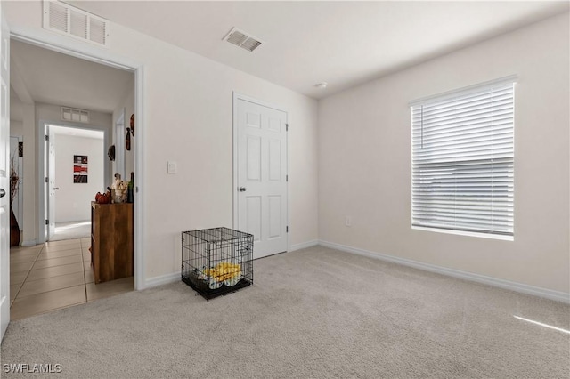 7024 Waldo Cir, Labelle, FL 33935 - unfurnished bedroom featuring carpet floors and baseboards
