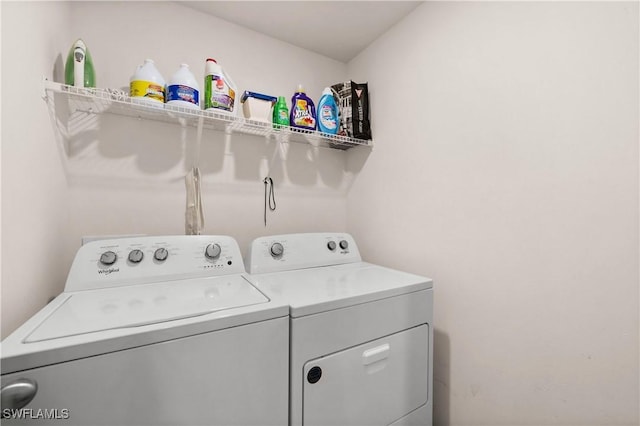 7024 Waldo Cir, Labelle, FL 33935 - laundry area featuring separate washer and dryer