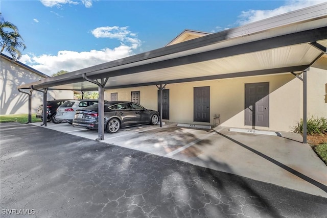 view of parking featuring a carport