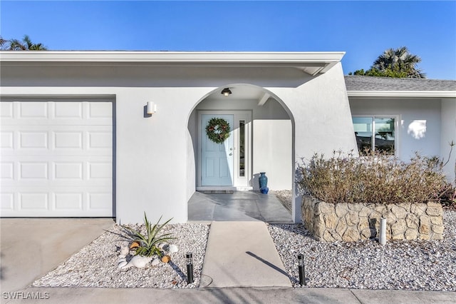 property entrance with a garage