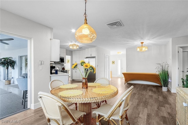 dining room featuring light hardwood / wood-style floors