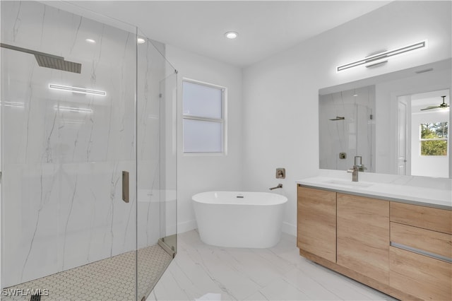 bathroom featuring vanity and plus walk in shower