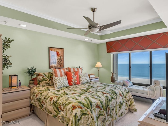 bedroom featuring light carpet, access to outside, a water view, and ceiling fan