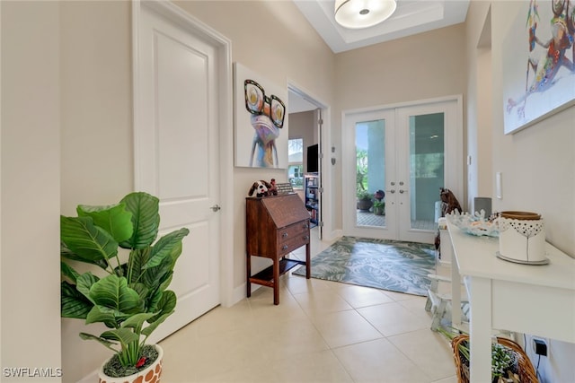 tiled foyer with french doors