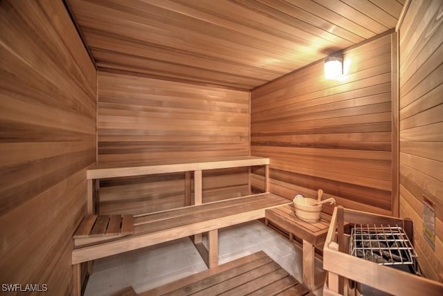 view of sauna / steam room with tile patterned floors