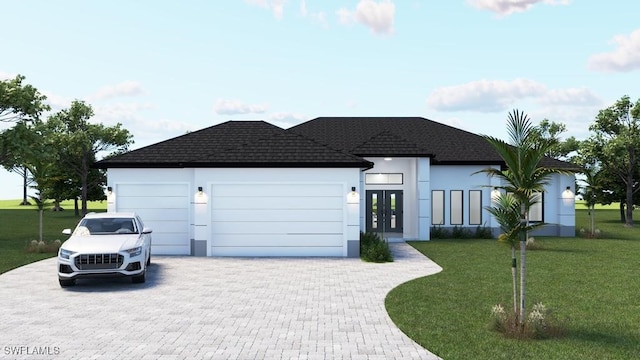 view of front of property featuring french doors, a front yard, and a garage