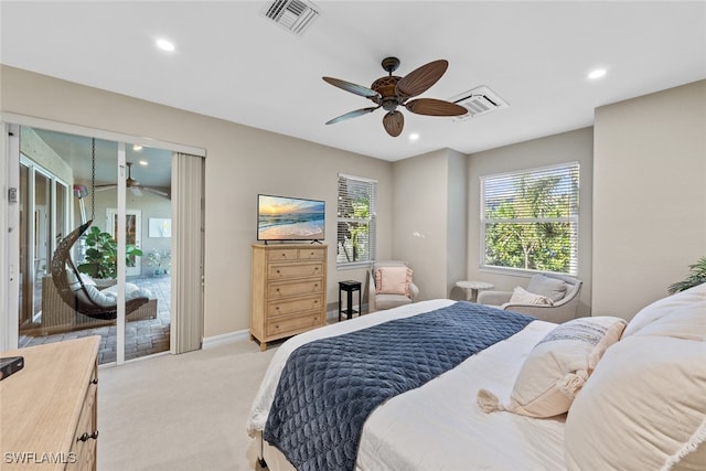 carpeted bedroom with access to exterior and ceiling fan