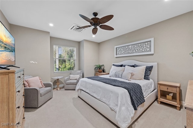 carpeted bedroom with ceiling fan