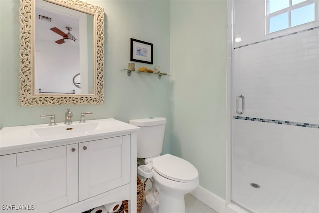 bathroom with a shower with door, vanity, and toilet