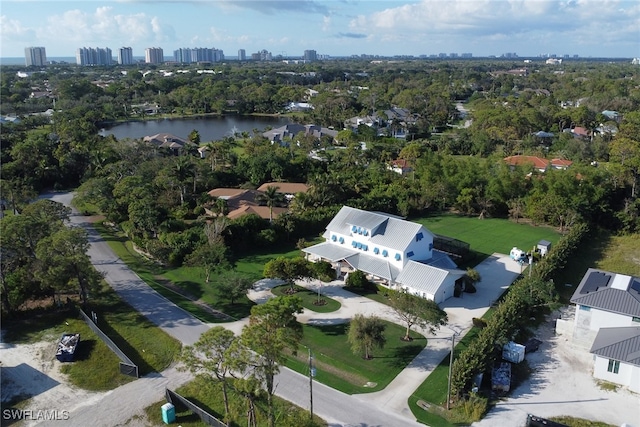 bird's eye view with a water view