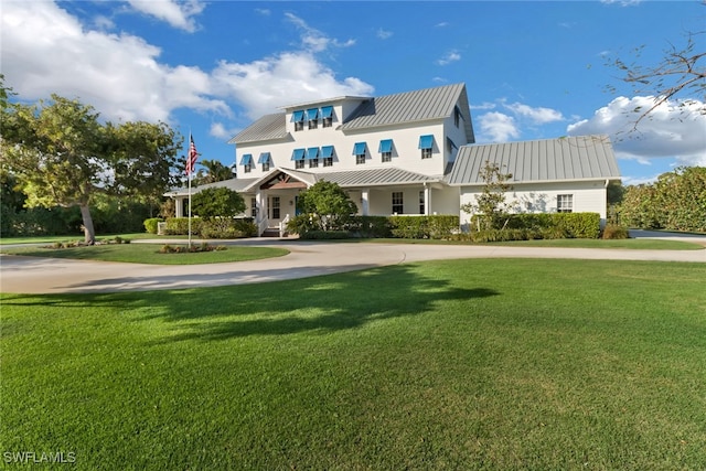 view of front facade with a front yard