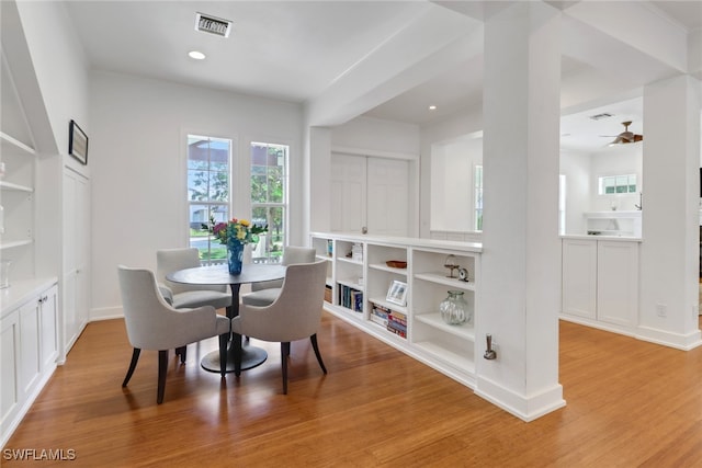 dining area featuring ceiling fan and light hardwood / wood-style flooring