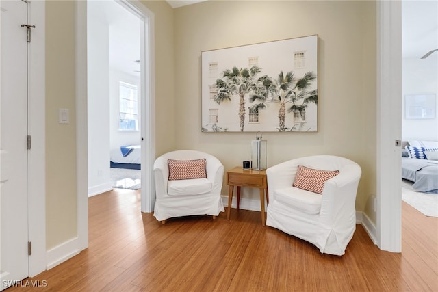 living area featuring hardwood / wood-style flooring