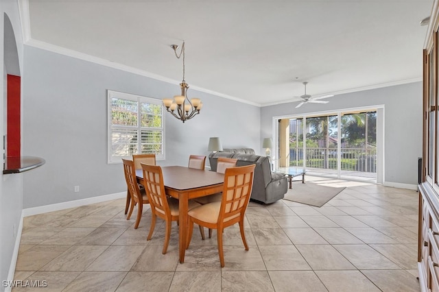 dining room with ornamental molding, ceiling fan with notable chandelier, and light tile patterned floors