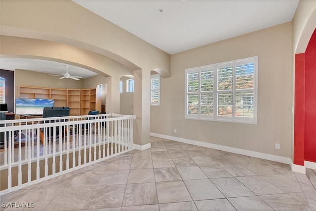 spare room with ceiling fan